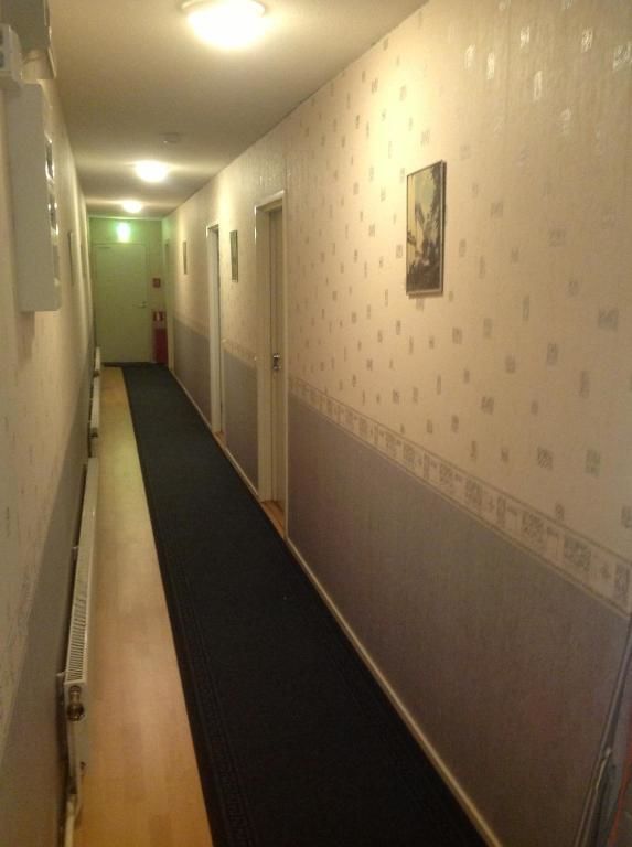 Отель Ämmän Hotelli Суомуссалми